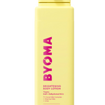 A yellow bottle of BYOMA brightening body lotion with pink and black text detailing the product name and description.