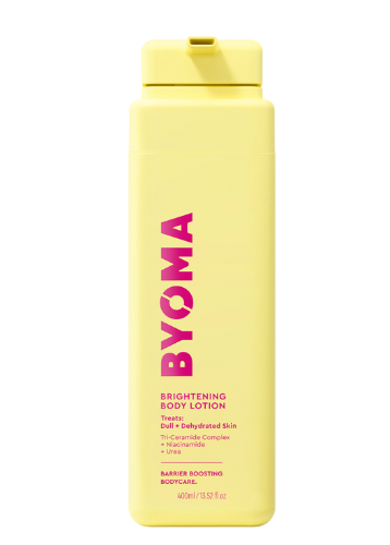 A yellow bottle of BYOMA brightening body lotion with pink and black text detailing the product name and description.