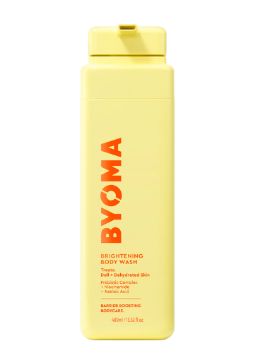 A yellow bottle of BYOMA Brightening Body Wash with product details in orange and black text.