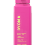 A bright pink bottle labeled 'BYOMA NOURISHING BODY OIL 200ml' with yellow and white text detailing the product type and brand.