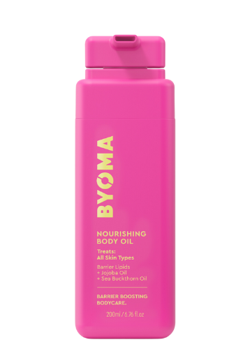 A bright pink bottle labeled 'BYOMA NOURISHING BODY OIL 200ml' with yellow and white text detailing the product type and brand.