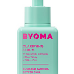 A teal dropper bottle labeled BYOMA Clarifying Serum, with text detailing the product's benefits and ingredients such as Tri-Ceramide Complex, Blue Tansy, PHA, and Zinc.