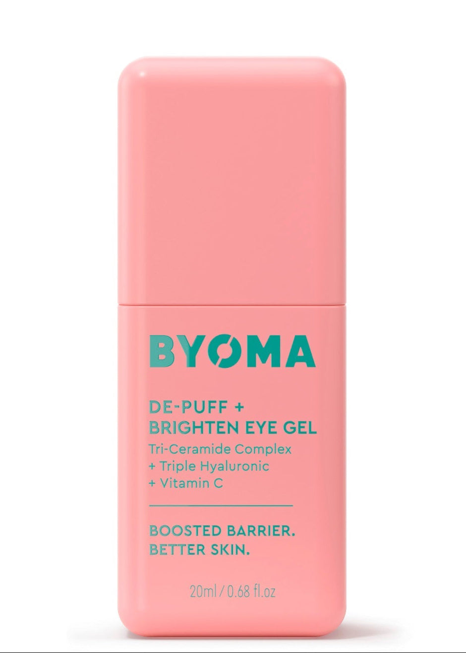 A pink BYOMA De-Puff and Brighten Eye Gel packaging with product details written in white.